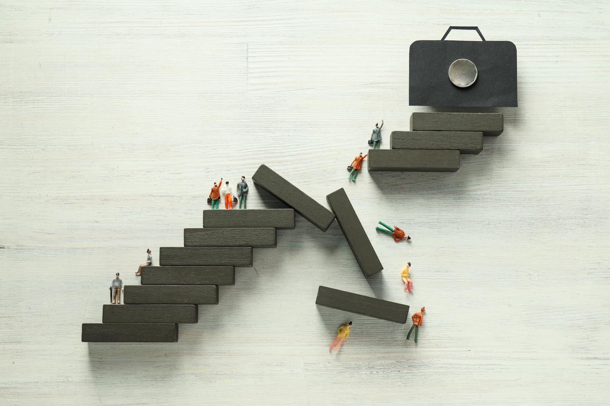Staircase collapsing mid-way, representing the workforce AI skills gap